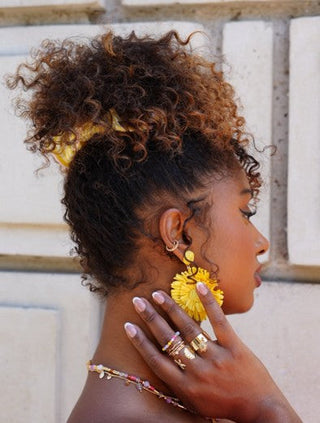 7 Must-Have Curly Hair Products For Every Curly Natural