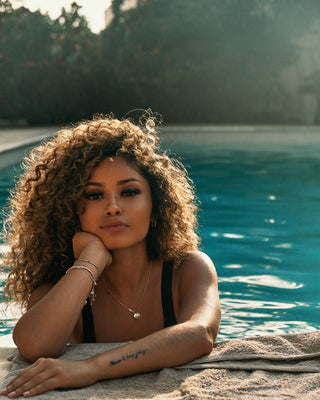 How To Prepare Your Curly Hair For A Vacation