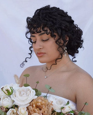 10 Beautiful Wedding Hairstyles For The Curly Bride
