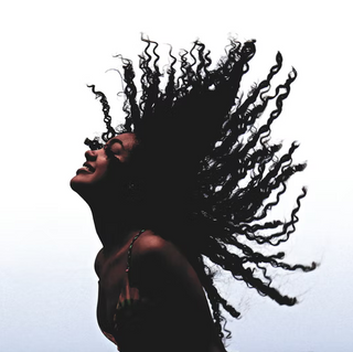 6 Ways To A Frizz-Free Spring For Your Afro Hair